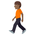 🚶🏾 person walking: medium-dark skin tone display on JoyPixels